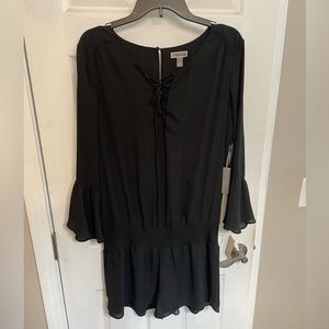 Black long sleeve shorts jumper.